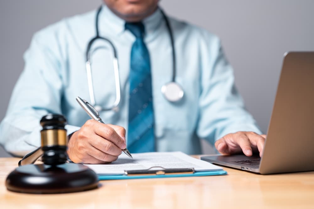 In personal injury law, a lawyer wields legal authority, balancing medicine and justice, guiding decisions with a gavel's weight to ensure rightful outcomes.