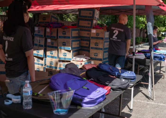 Backpack Giveaway Event - Khan Injury Law khan injury law backpack event