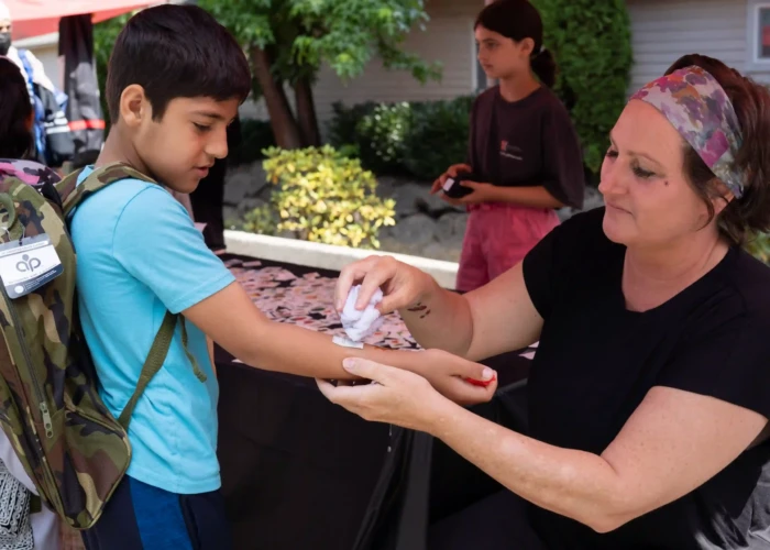 Backpack Giveaway Event - Khan Injury Law khan injury law backpack event